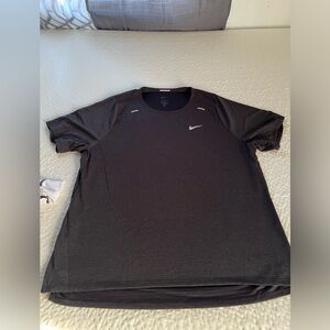 1 shirt and 4 sleeveless work out tops